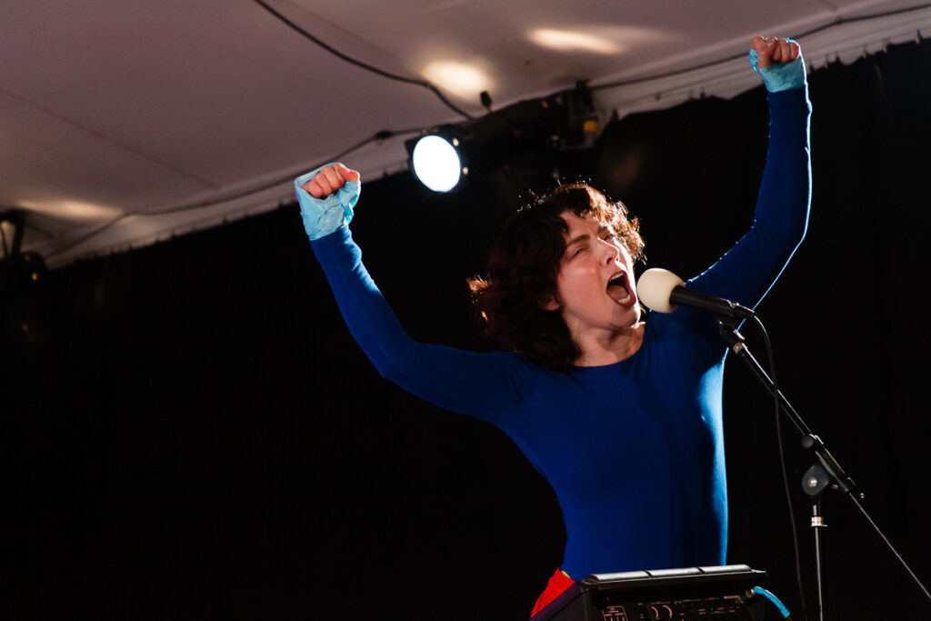 Photo of performer Kye Grant in performance of TIMES SQUARE LAS VEGAS