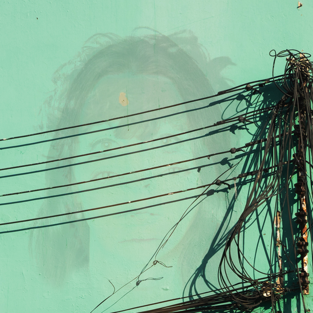 Photo of performer Olivia Bratko overlaid by phone lines.